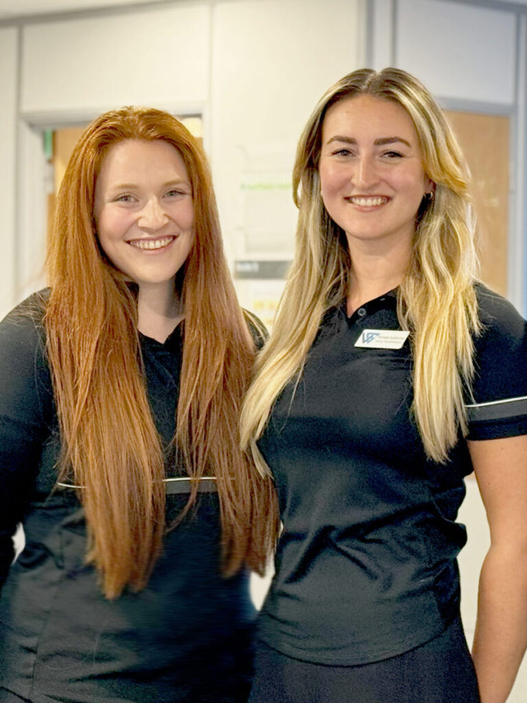 Physiotherapy team standing together in Reception